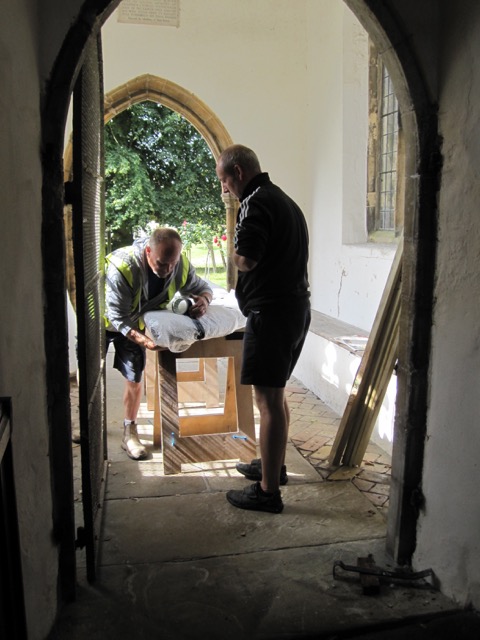 St George's Great Bromley Essex 2015 south door being wrapped for transport to the workshop